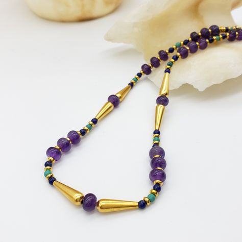 These Egyptian inspired jewelry features amethyst, turquoise, lapis beads. Ancient Egypt, one of the richest and most advanced of the early civilizations, appeared on the stage of history around 3100 B.C.. Jewelry was often worn as protective talismans. Gold was believed to reflect the life-giving rays of the sun. The color and brilliance of gemstones traditionally determined their value and religious significance. #museumjewelry #handmadejewellery #egyptian #etsystore #etsyshop #museumrepro... Egyptian Inspired Jewelry, Early Civilizations, Egyptian Necklace, Egyptian Inspired, Rays Of The Sun, Inspired Jewelry, The Stage, Ancient Egyptian, Ancient Egypt