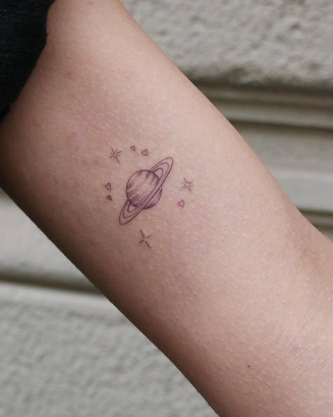 Saturn Tattoo Minimalist, Planet Tattoo, Saturn Tattoo, Inner Arm Tattoos, Tattoo Aesthetic, Planet Tattoos, Small Pretty Tattoos, Stylist Tattoos, Discreet Tattoos