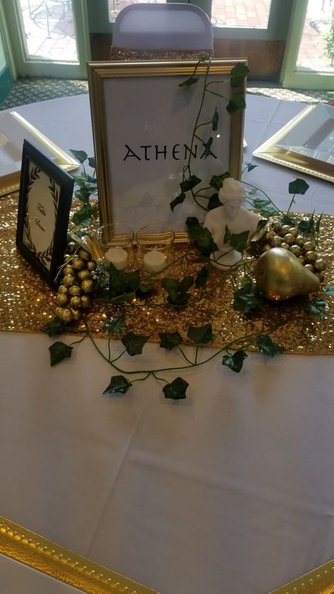 Greek God Prom Theme, Greek Themed Centerpieces, Greek Mythology Quinceanera, Greek God Party Decorations, A Night In Athens Prom Theme, Greek Mythology Centerpieces, Greek Event Decor, Greek Mythology Themed Wedding, Greek Party Theme Decoration