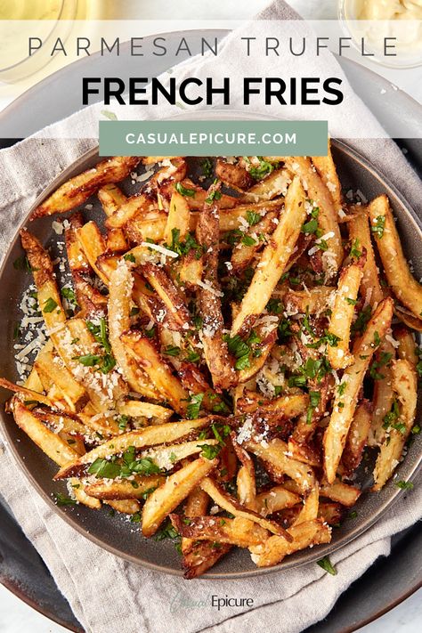 Elevate your French fry game with these delicious Parmesan Truffle Fries. Crispy on the outside and tender on the inside, the fries are tossed in grated parmesan cheese and truffle oil. Enjoy these tasty fries as a side dish or shareable appetizer. French Fry Recipe Ideas, Sides Potatoes, Meal Sides, Parmesan Truffle Fries, Yummy Fries, Homemade Truffles, Homemade French Fries, Truffle Fries, Trendy Food