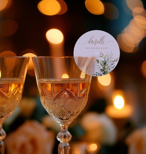 Greenery Champagne Place Cards, Rehearsal Dinner Champagne Glass Tags, Wedding Champagne Glass Circle Place Cards, Round Place Cards #c61 Circle Place Cards, Place Cards Wedding Table, Champagne Pour, Wedding Table Decor Ideas, Glass Circle, Gold Font, Place Cards Wedding, Toasting Glasses, Wedding Champagne