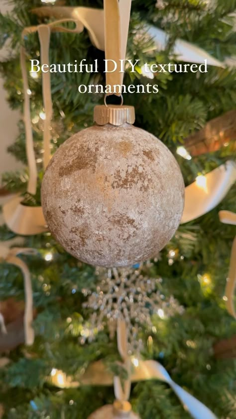 Let’s make these beautiful DIY textured ornaments. 🌲 Using shatterproof clear ornaments, apply two coats of matte acrylic paint mixed with baking soda, drying between coats. 🌲After those coats are dry, heavily load your paint brush with the paint/baking soda mixture. Apply to the ornaments in patting motions slowly to pull the wet paint upwards creating extra dimension and texture. 🌲Using a natural sponge, and a lighter shade paint, gently tap the paint over the ornament. 🌲While the paint is very slightly wet, roll the ornament in ground cloves. 🌲Once dry, brush off excess cloves with a clean paint brush. 🌲Apply Rub n Buff and metallic paint to create the antique effect. Not only are these ornaments gorgeous with their texture, dimension, and antique effects, but they smell incred Paint Baking Soda, Textured Ornaments, Make Christmas Tree, Natural Sponge, Clear Ornaments, Handmade Christmas Crafts, Acrylic Craft Paint, Christmas Themes Decorations, Painted Christmas Ornaments