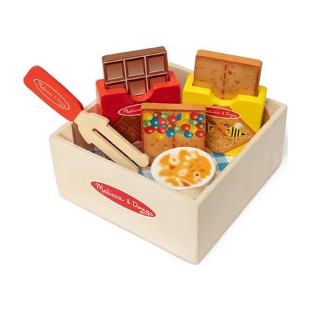 Great for pretend picnics or play kitchens and restaurants, this sturdy wooden crate is filled with wooden play food for making a deliciously imaginative dessert! Stack the pieces to create a yummy pretend play s'mores treat. Pieces include wooden marshmallow that fits on a roasting stick, 2 graham crackers in a box, and a chocolate bar in a box. Mix and match with other Melissa & Doug Picnic Box Play Sets! Size: 2.350"L x 5.200"W x 5.200"H.  Color: Multicolor. Wooden Marshmallow, Wooden Play Food, Picnic Box, Preschool Girl, Play Kitchens, Play Food Set, Wooden Food, Paper Toys Template, Pretend Food