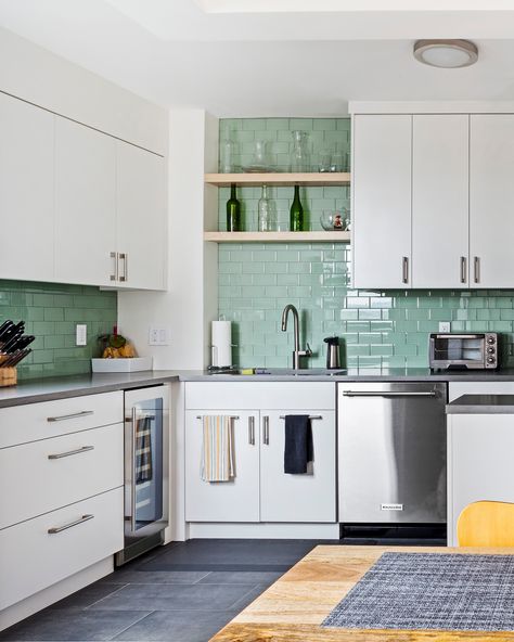 For a couple that loves to cook, finding an apartment with a spacious kitchen was on their wishlist ⭐ After being outbid on an apartment in Clinton Hill, the couple chose to buy a fixer upper unit and renovated the kitchen to fit their needs. Dark Teal Backsplash Kitchen, Funky Kitchen Tiles, Kitchen Teal Backsplash, Teal Kitchen Backsplash, Teal Backsplash Kitchen, Beautiful Kitchen Tiles, Contemporary Kitchen Tiles, Ceramic Kitchen Tiles, Tile Renovation