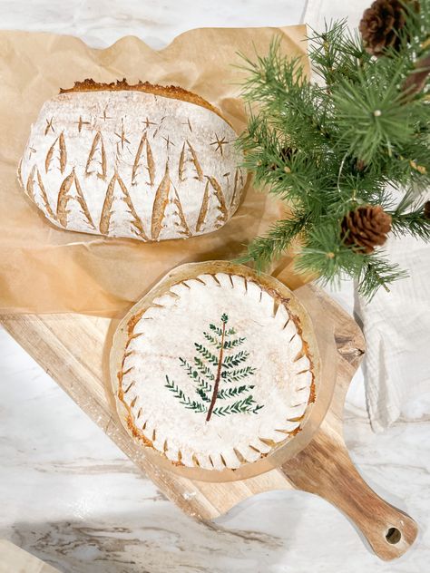 Sourdough bread winter/christmas design Christmas Bread Packaging Ideas, Christmas Bread Designs, Decorative Sourdough Bread, Christmas Sourdough Design, Winter Sourdough Scoring, Christmas Sourdough Bread Scoring, Christmas Bread Scoring, Sourdough Christmas Gift, Sourdough Gift Basket