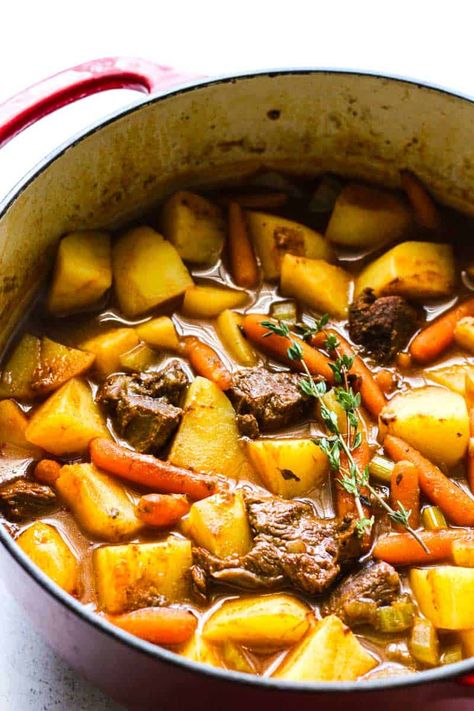 elk stew with potatoes and thyme springs on top Elk Stew, Elk Meat Recipes, Elk Steak, Elk Meat, Dinner Recipes For Beginners, Elk Recipes, Round Steak Recipes, Chicken Stock Recipe, Stew Meat Recipes