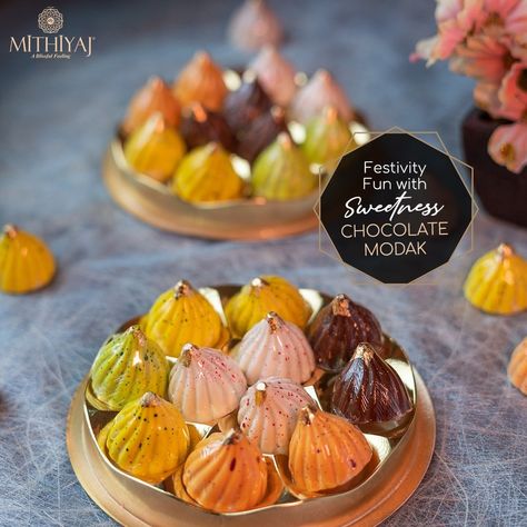 Elevate your Ganpati festivities with the divine flavors of Chocolate Modak from #Mithiyaj. A contemporary take on a cherished tradition. Place an Order 👇 Byculla (W) 📞 +91 74000 11120 Kurla (W) 📞 +91 74000 09617 OR 🌐 www.mithiyaj.com #MithePeRajMithiyaj #modak #chocolatemodak #chocolatefilledmodak #kesarmawamodak #kajumodak #whitemawamodak #stuffedmodak #ganeshchaturthispecial #ganeshchaturthi #indiansweet #festivespecial #snacktime #trendycake #personalizeyourcake #cake #birthdaycake Chocolate Modak, Bridal Boutique Interior, Sweet Box Design, Chocolate Work, Indian Sweet, Sweet Box, Place An Order, Boutique Interior, Ganesh Chaturthi