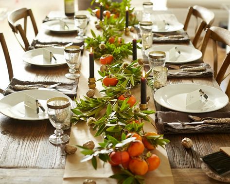 Adding a pop of color to your holiday table is easy! Simply add a few Persimmons, still on the branch! The green and orange will leave a lasting impression on your guests. And the best part, let them eat the center piece! Sowden House, Tabletop Garden, Entertaining House, Festive Dinner, Simple Centerpieces, Thanksgiving Table Settings, Thanksgiving Centerpieces, Thanksgiving Table Decorations, Easy Thanksgiving