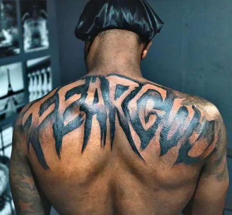 18 Most Specific Fear God Tattoo Design Ideas - Tattoo Twist Fear God Tattoo, God Tattoo Ideas, Back Tattoos For Guys Upper, Upper Shoulder Tattoo, Fear Tattoo, Black Men Tattoos, Tattoo On Chest, Upper Back Tattoos, Back Tats