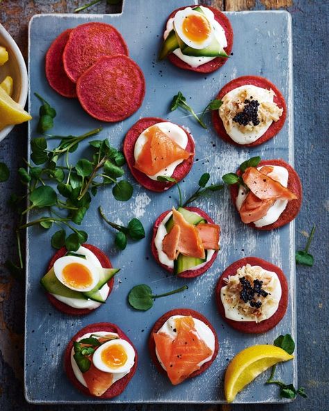 Mini beetroot and horseradish blinis | delicious. magazine Salmon Starter, Salmon Blinis, Smoked Salmon Blinis, Potato Bake Recipe, Salmon Fillet Recipes, Canapes Recipes, Baked Gnocchi, Starter Recipes, Potato Bake