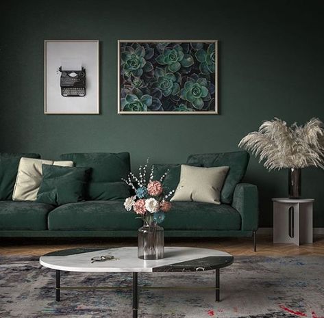 If you're looking for ways to bring the outside in, you might want to consider incorporating the color green. It's a timeless choice that can impart a range of emotions depending on the shade and intensity. #hunkerhome #green #greencolor #colorideas #homedecor Dark Green Sofa Color Combinations, Green Sofa Living Room Colour Schemes Interior Design, Dark Green Couches, Green Room Design, Green Couch Living Room, Green Sofa Living Room, Tv Lounge, Dark Green Wallpaper, Dark Green Walls