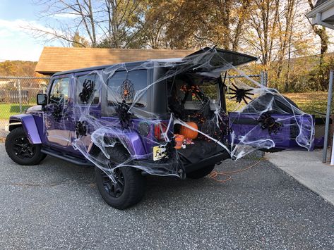 Jeep trunk or treat Trick Or Treat Car Trunk, Jeep Trunk Or Treat Decor, Trunk Or Treat Jeep Wrangler Ideas, Halloween Trunk Or Treat Ideas For Jeep Wrangler, How To Decorate Your Jeep For Halloween, Halloween Jeep Decorations Trunk Or Treat, Spider Theme Trunk Or Treat, Halloween Decorations For Jeep Wrangler, Jeep Halloween Trunk Or Treat