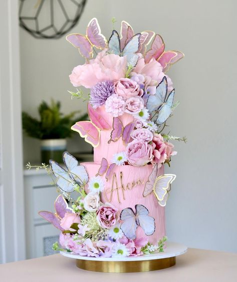 @cakes.by.estee shared a photo on Instagram: “Butterfly Dreams 🌸🦋🌸 I love cake and cupcake combos. Two tier floral butterfly cake with 24 matching cupcakes 🦋🌸🦋 Ballerina Pink…” • Jun 5, 2022 at 5:09pm UTC Floral Butterfly Cake, Butterfly Theme Cake, Birthday Cake Clip Art, Lotus Cake, Butterfly Wedding Cake, Butterfly Birthday Party Decorations, Flower Cake Design, Pink Buttercream, Butterfly Birthday Cakes