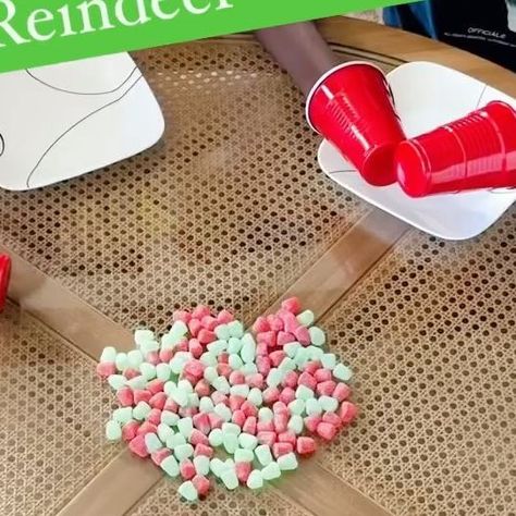 AMBER MAMIAN on Instagram: "🎄Holiday Game #3 🎄- HUNGRY HUNGRY REINDEER This one is ridiculously fun and so easy to set up. Here’s how to play! Step 1: Spread out some candy on the table (we used gum drops) Step 2 Grab a pair of cups for each players hands to make your “hooves” (you know we have an endless supply of solo cups) Step 3 lay out a bowl or plate for each reindeer to scoop their candy into. Step 4: Pick up as much candy on to you plate using your hooves! The reindeer with the most candy on their plate wins. Poor Shea was having a heck of a time scooping up his food. No more reindeer games for him. #christmasgames #familygames #holidaygames" Reindeer Hoof Game, Reindeer Relay Race With Cups, Hungry Reindeer Game, Hungry Hungry Reindeer Game, Marshmallow Games, Church Games, Xmas Games, Hand Games, Red Solo Cup