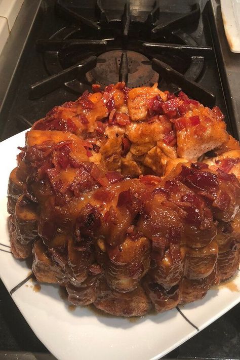 Maple Bacon Monkey Bread | "Sweet and salty monkey bread with a delicious twist - bacon! This recipe was created from two existing recipes, with the idea courtesy of the St. Louis Post Dispatch." #breakfastrecipes #brunchrecipes #breakfastideas #brunchideas #breakfastcasserole #breakfastcasserolerecipe #makeaheadbreakfastcasserole Maple Bacon Monkey Bread, Bacon Twist Recipe, Bacon Pull Apart Bread, Bacon Monkey Bread, Maple Bacon Cinnamon Rolls, Bacon Cinnamon Rolls, Monkey Breads, Savory Monkey Bread, Monkey Bread Recipe