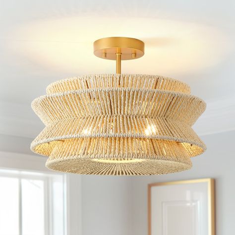 Coastal-inspired semi-flush mount ceiling light, crafted of hand-woven rattan rope drum shade and antique gold or black hardware, is the unique blend of eclectic nautical and mid-century contemporary style. Filtering the light from within, each piece creates a play of light and shadow in a room, adding an inviting ambiance. This collection can work with a variety of boho decors and even work in homes with coastal or farmhouse styling, which is an ideal selection for hallways, entryways, ... Dimmable Chandelier, Mid Century Contemporary, Abstract Tile, Scott Living, Entryway Lighting, Empire Chandelier, Rattan Pendant, Drum Chandelier, Semi Flush Mount Lighting