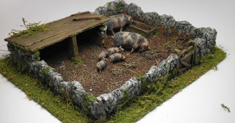 A farm setting on the gaming table isn't complete without a pig pen, hence my DIY pen. Dimensions 15 cm x 12 cm. I decided that the a p... Diy Pen, Pig Pen, Game Terrain, Animal Pen, Model Train Sets, Gaming Table, Model Train Scenery, Pig Farming, Wargaming Terrain