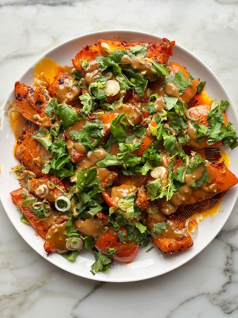 Harissa roast pumpkin with tahini sauce | Ottolenghi Recipes Brunch Salad, Ottolenghi Recipes, Pumpkin Dishes, Bakery Products, Roasted Pumpkin, Tahini Sauce, Roast Pumpkin, Party Food And Drinks, The Flesh