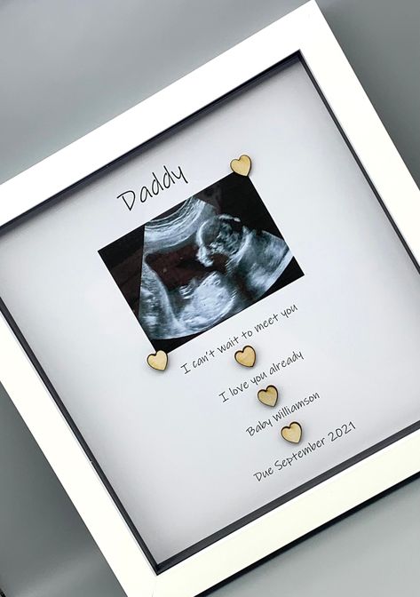 Personalised Baby Scan Frame, Expectant Dad Gift, Baby Shower Gift For Him, First Fathers Day Beautiful handmade gift frame, the perfect gift for the expectant Dad. With space to attach your baby scan picture once you receive the frame. Beautiful keepsake gift for Dad to be. ⭐Frame has glass frontage ⭐Frame measures 9x9 inches square ⭐Frame hangs on a wall or stands on any flat surface ⭐Free gift box with every frame ⭐Frame is white in colour To see more Dad gift frames, click the link below. ht Baby Footprint Keepsake, Baby Scan Frame, Dad Baby Shower Gift, Gifts For Expecting Dads, Footprint Keepsake, Christmas Eve Box Fillers, Baby Scan, First Fathers Day Gifts, Great Gifts For Dad