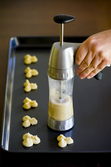 Caramelized Banana Spritz Cookies | Cupcake Project Wilton Cookie Press Recipe, Wilton Cookie Press, Chocolate Spritz Cookies, Cream Cheese Spritz Cookies, Press Cookies, Cookie Press Recipes, Mirro Cookie Press, Cookie Machine, Spritz Cookie