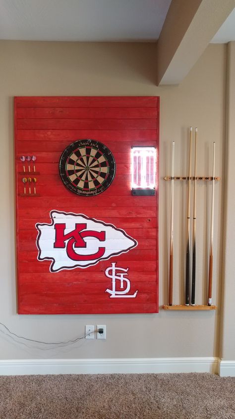 Kansas City Chiefs/Cardinals dartboard backboard Man Cave Theme Ideas, Sports Decor Man Cave, Dartboard Backboard, Basement Sports Bar, Kansas City Chiefs Craft, Chiefs Crafts, Football Man Cave, Royal Wallpaper, Johannes Gutenberg