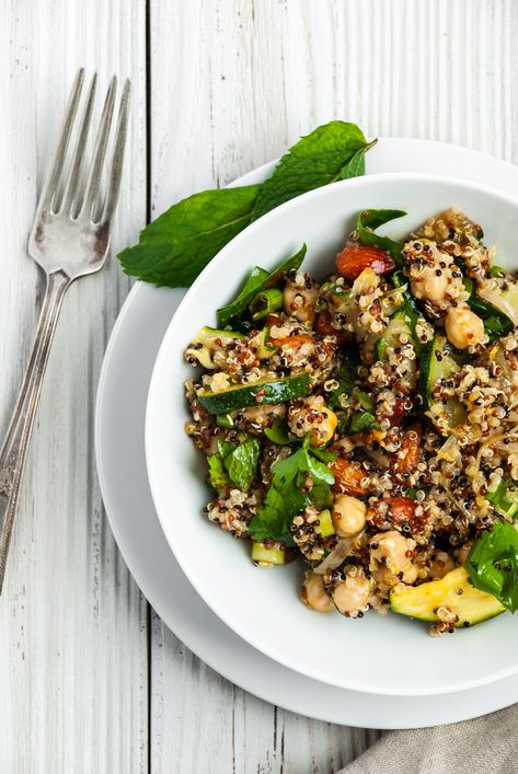 A simple salad recipe featuring zucchini, quinoa, chickpeas, spinach, almonds and herbs. This salad is absolutely perfect for your next BBQ or potluck! #healthysalad #potluck #vegan  | The Crooked Carrot Quinoa Salad Recipes Healthy, Moroccan Quinoa, Zucchini Quinoa, Seasonal Salad, Simple Salad, Quinoa Salad Recipes, Summer Salad Recipes, Carrot Recipes, Healthy Ingredients