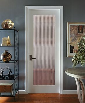 This beautiful vertical Reed glass interior decorative door offers obscurity and modern appeal for residential applications. This fluted glass interior door is a great choice for kitchens, laundry rooms, offices and any room where style and light is desired, but not full visibility. The Reed style door is offered in a variety of 9 wood species to complement any interior including: primed white, pine, oak, knotty pine, hemlock-fir, maple, knotty alder, cherry and African mahogany. Door Hallway, Frosted Glass Interior Doors, Future Furniture, Door Bedroom, House Redo, Frosted Glass Door, Reeded Glass, Asian Interior, Glass French Doors