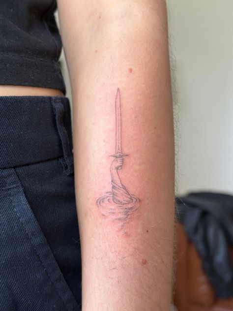 Tattoo 
Handpoke
Stick and poke
Sword tattoo Lady Of The Lake Tattoo, Lady In The Lake, Lake Tattoo, Lady Lake, Lady Of The Lake, Black Ink Tattoos, Ink Tattoo, I Tattoo, Tatting