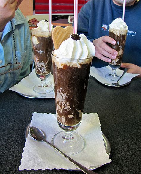 Eiskaffee (Germany). 'Eiskaffee, literally "ice cream coffee", is a popular German drink consisting of chilled coffee, milk, sweetener, vanilla ice cream, and sometimes whipped cream.' http://www.lonelyplanet.com/germany German Drinks, German Sweets, Iced Chocolate, Ice Cream Coffee, German Foods, Coffee Ice Cream, Ice Coffee, Dairy Products, European Food