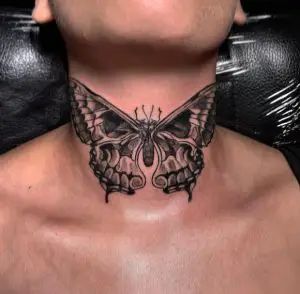 Butterfly Skull Neck Tattoo, Butterfly Tattoo On Front Neck, Moth Throat Tattoo Men, Moth Neck Tattoo Men, Butterfly Front Neck Tattoo, Neck Moth Tattoo, Butterfly Neck Tattoo Men, Middle Of Neck Tattoo, Butterfly Throat Tattoos Women