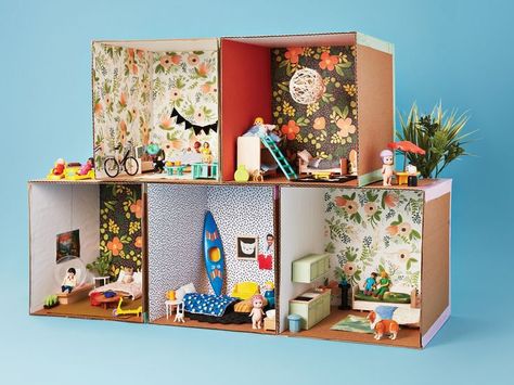 Banish rainy day boredom with a cardboard craft. These dollhouse apartments are fun to build and decorate. Cardboard Box Dollhouse, Cardboard Box Doll House, Cardboard Dollhouse, Cardboard Craft, Cardboard Toys, Diy Xmas Gifts, Kid Friendly Activities, Cardboard House, Toddler Dolls