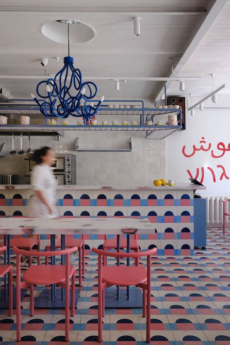 Colourful Geometric Patterns Imbue a Middle Eastern Café in Moscow with Playful Exuberance | Yatzer Blue Hallway, Window Nook, Solid Oak Table, Communal Table, Wall Niche, Studio Studio, Kitchen Views, Architecture Studio, Creative Workshop