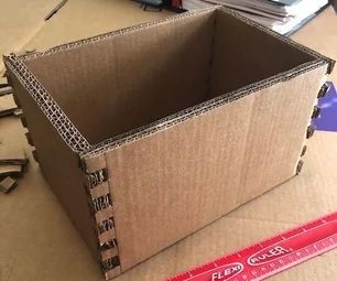 Box Jointed Cardboard Box Diy Cardboard Storage Box With Lid, Cardboard Box Nightstand Diy, Diy Models Projects, How To Make Box Out Of Cardboard, How To Make A Small Box Out Of Cardboard, Cardboard Box Upcycle, Painting Cardboard Boxes, Diy Box Storage, Cardboard Box Storage