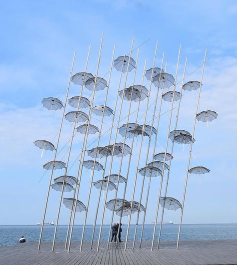 Umbrella Sculpture, Water Sculpture, Sculptures Art, Red Umbrella, Greek Art, Umbrella Academy, Public Art, Art And Architecture, Wind Turbine