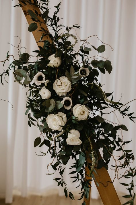 Flowers on triangle arbor Triangle Arbor With Flowers, Green And Black Wedding Flowers, Black And Green Wedding Aesthetic, Dark Wedding Arch, Black Lantern Wedding, Black Wedding Arch, Black And Green Flowers, Triangle Arbor, Wedding Decor Flowers