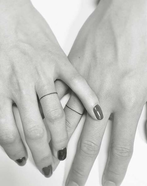 23 Best Matching Couple Tattoos To Show Your Love | StayGlam Ring Tattoo Designs, Wedding Band Tattoo, Tattoo Wedding, Small Couple Tattoos, Tattoo Wedding Rings, Ring Finger Tattoos, Couples Tattoo Designs, Matching Couple Tattoos, Disney Tattoo