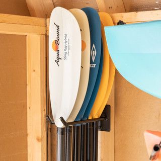 Life Jacket Storage Ideas, Paddle Storage, Kayak Storage Garage, Paddle Board Storage, Jacket Storage, Canoe Storage, Cabin Storage, Wall Stud, Canoe Paddles