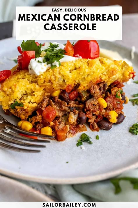 Mexican Cornbread Casserole combines ground beef, black beans, corn, and a blend of spices topped with cheesy cornbread for a delicious meal! via @sailor_bailey Black Bean And Corn Casserole, Soup And Cornbread, Spicy Cornbread Casserole, Ground Turkey Cornbread Casserole, Mexican Casserole With Cornbread, Hamburger Meat Corn Black Beans, Ground Meat Cornbread Casserole, Cornbread Taco Bake, Mexican Cornbread Casserole Jiffy Ground Beef