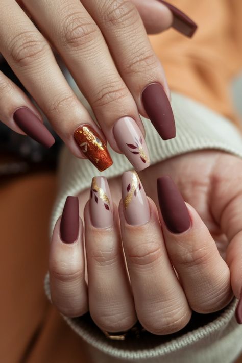 Embrace the season with these chic coffin fall nail ideas that bring warmth and style to your fingertips! Picture deep burgundy shades accentuated with delicate gold foil, capturing the essence of autumn leaves. This elegant design perfectly complements cozy sweaters and pumpkin-spiced lattes, making it a must-try for any fall lover. Explore this stunning look and let your nails reflect the beauty of the season! Fall Nails Coffin Shape, Fall Nails Coffin, Nails Sharp, Burgundy Shades, Fall Nail Ideas, Coffin Shape, Cozy Autumn, Deep Burgundy, Fall Nail