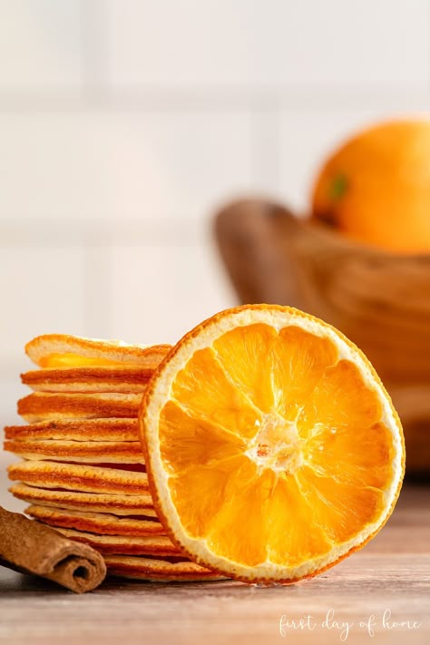 Learn how to make beautiful dried orange slices to use as home decorating accents or culinary garnishes. Find out which drying method is best for you, and see examples of different orange varieties. #driedoranges #orangeslices #firstdayofhome Dried Orange Slices In Oven, Dry Out Orange Slices, Oven Dried Orange Slices, Orange Slices Decorations, How To Dry Orange Slices In The Oven, Dried Mandarin Orange Slices, How To Dry Oranges For Decoration, How To Dry Oranges, How To Dry Orange Slices