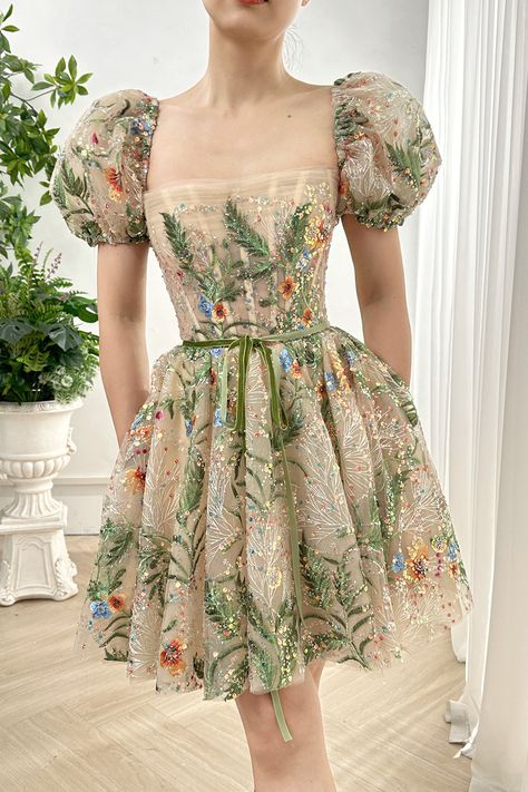 Stay stylish and comfortable with our Short Puff Sleeves Corset Floral Embroidery Beaded Mini Dress. The corset design offers a figure-flattering fit, while the delicate floral embroidery adds a touch of elegance. Perfect for any occasion, this dress will make you feel confident and effortlessly chic. Bust and Skirt with full lining. 100% Polyester 100% Recycled polyester lining Concealed zip at center back Imported Enchanted Outfit, Midsommar Wedding, Dresses For Cocktail Party, 23rd Birthday Decorations, Debut Gown, Edie Rose, Gold Gowns, Patterned Bridesmaid, Dress For School