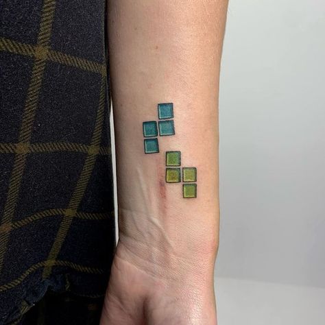 chloe on Instagram: "Some falling Tetris cubes! Thankyou 🖤 . . . . . . . #tattooapprentice #colourtattoo #tetristattoo #tetris #smalltattoo #wristtattoo #smalltattoos" Tetris Tattoo Ideas, Tetris Tattoo, Palm Tattoos, Tattoo Apprentice, Wrist Tattoos, Color Tattoo, Tattoos And Piercings, Small Tattoos, Geometric Tattoo