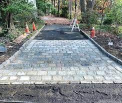 Essex & Morris Contracting Co Inc - Jumbo Belgian Block apron added to an existing customers driveway done a few years back. This apron has a 5” thick, 4000 psi concrete base Driveway Apron, Belgian Block, Driveway, Apron