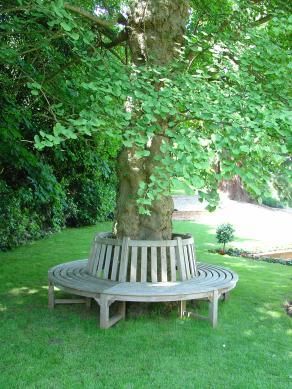 Shailesh Rajput Round Tree Bench, Round Bench Around Tree, Circle Bench Around Tree, Secret Garden Bench, Tree Bench Wrap Around, Seating Around Tree, Bench Around Trees, Round Bench, Tree Seat