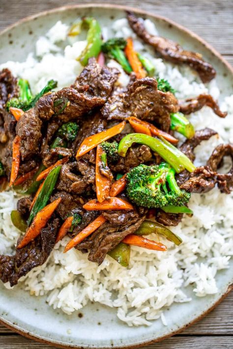 Plate of Beef Stir Fry With Rice Beef And Vegetable Stir Fry, Stir Fry With Rice, Kale Stir Fry, Stir Fry Seasoning, Stir Fried Rice, Vegetarian Stir Fry, Beef Stir Fry Recipes, Stir Fry Rice, Dinner Rotation