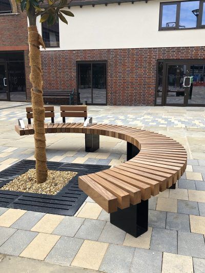 Benchmark street furniture - Exeter EX007 bench Park Bench Design, Street Bench, Tree Seat, Wood Bench Outdoor, Tree Bench, Curved Bench, Outside Seating, Architectural Engineering, Landscape Architecture Design