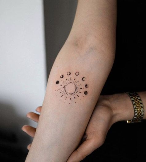 Discover the allure of Moon phase tattoos. We will explore the best designs and insights on choosing the ideal placement. 8888 Tattoo, Moon Planet Tattoo, Tattoo Sonne, Planet Tattoo, Tattoo On Wrist, Space Tattoos, Moon Phases Tattoo, Moon Planet, Planet Tattoos