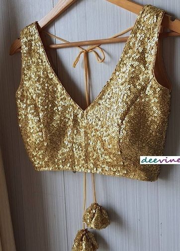 Golden Choli Designs, Golden Blouse For Saree, Golden Blouse Lehenga, Golden Sleeveless Blouse Designs, Golden Blouse For Lehenga, Golden Blouse Designs Lehenga Choli, Golden Blouse Ideas, Sleeveless Golden Blouse, Golden Blouse Designs Saris