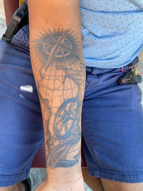 Guyana Tattoo Ideas, Anchor And Wheel Tattoo, Guyana Tattoo, Ship Wheel Tattoo, Guyana Map, Scott Tattoo, Dragon Koi Tattoo Design, World Map Tattoos, Wheel Tattoo