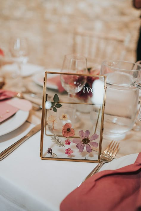 Glass Frame Table Numbers Wedding, Table Numbers In Frames, Pressed Flower Table Numbers Diy, Wildflower Wedding Table Numbers, Pressed Flower Name Card, Tablenumber Wedding Diy, Dried Flower Table Numbers, Pressed Flower Wedding Decor, Table Names Wedding Ideas